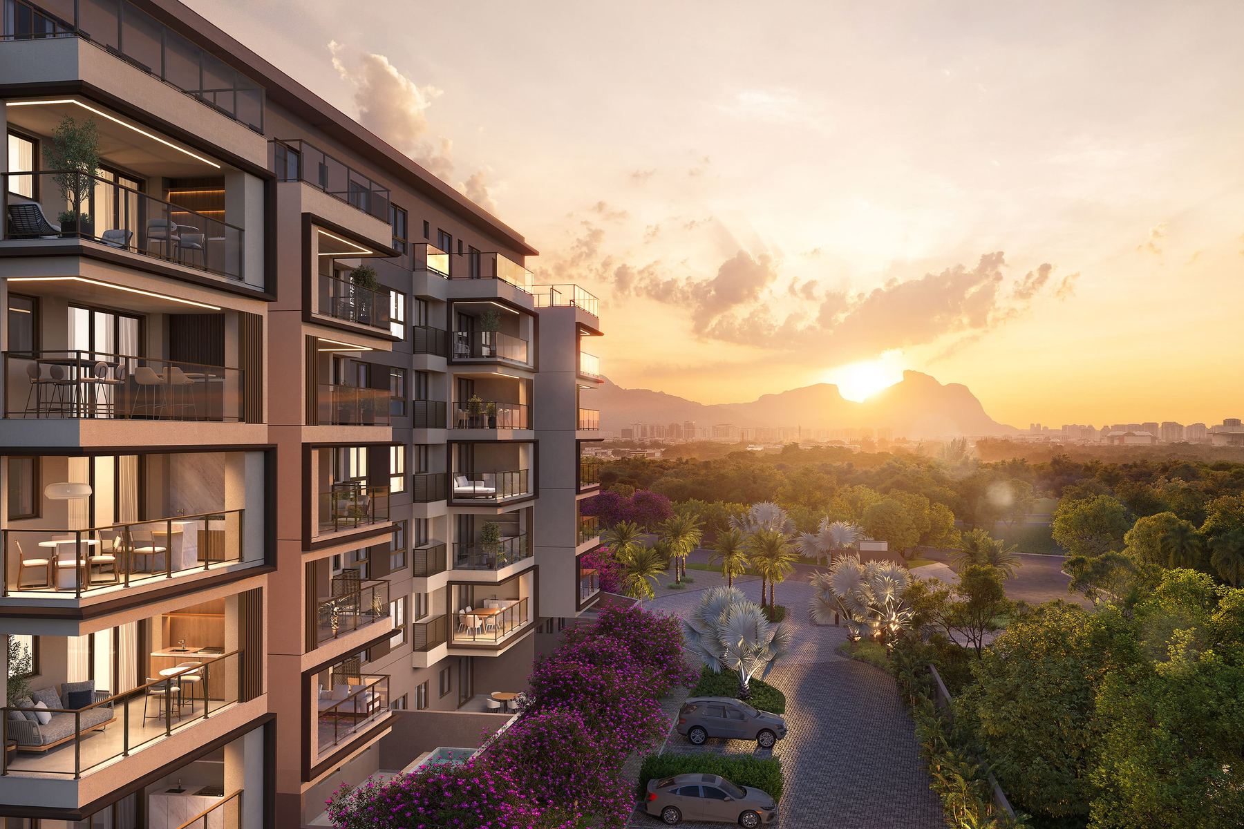 Fachada do Woods Park Design, com varandas integradas ao verde ao entardecer